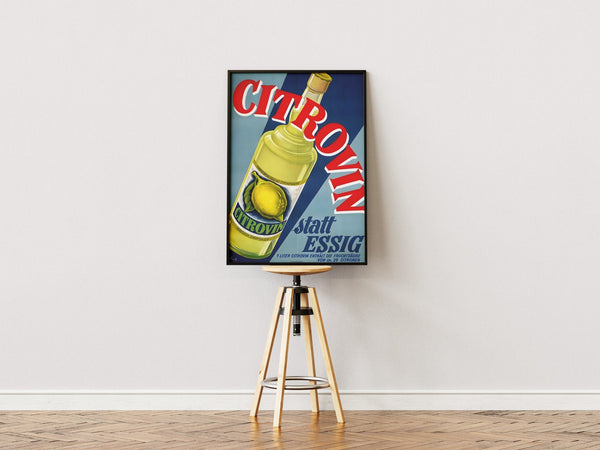 Vintage Citrovin plakat med stor citronflaske og rød/blå typografi – retro reklame for citronessens i tysk designstil.