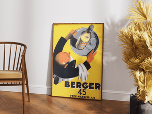 Vintage Banania plakat med smilende mand og ske – fransk retroreklame i gule og røde farver med teksten "Petit Déjeuner Familial".