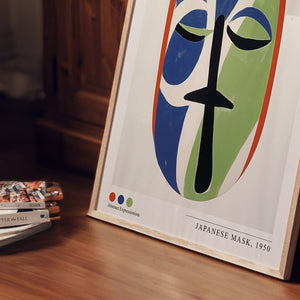 Plakat med farverigt stiliseret ansigt inspireret af Henri Matisse i blå og grønne former