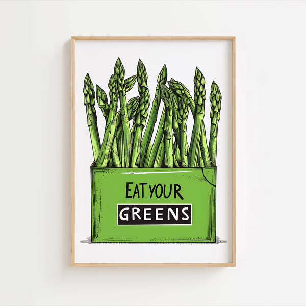 Køkkenplakat med grønne asparges og teksten "Eat Your Greens" i en træramme – sjov og farverig vægdekoration til køkkenet.