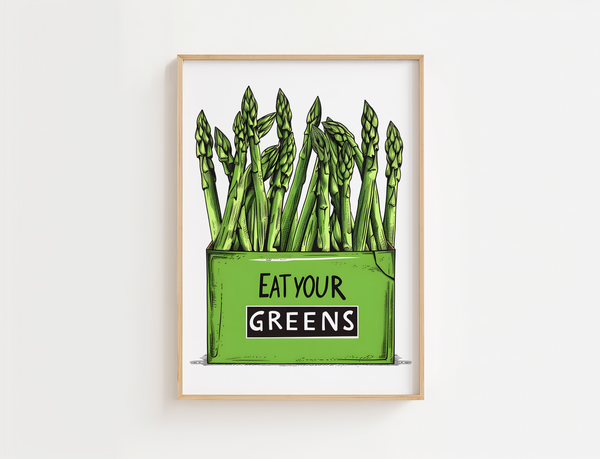 Køkkenplakat med grønne asparges og teksten "Eat Your Greens" i en træramme – sjov og farverig vægdekoration til køkkenet.