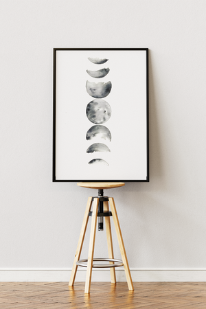 Månefaser plakat i sort-hvidt minimalistisk design med illustration af månens forskellige faser