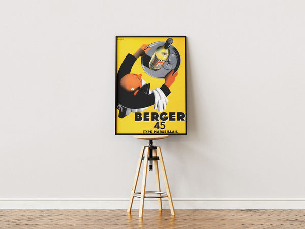 Vintage Banania plakat med smilende mand og ske – fransk retroreklame i gule og røde farver med teksten "Petit Déjeuner Familial"