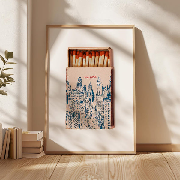 Plakat med New York tændstikæske i retro stil og illustration af storbyens skyline.
